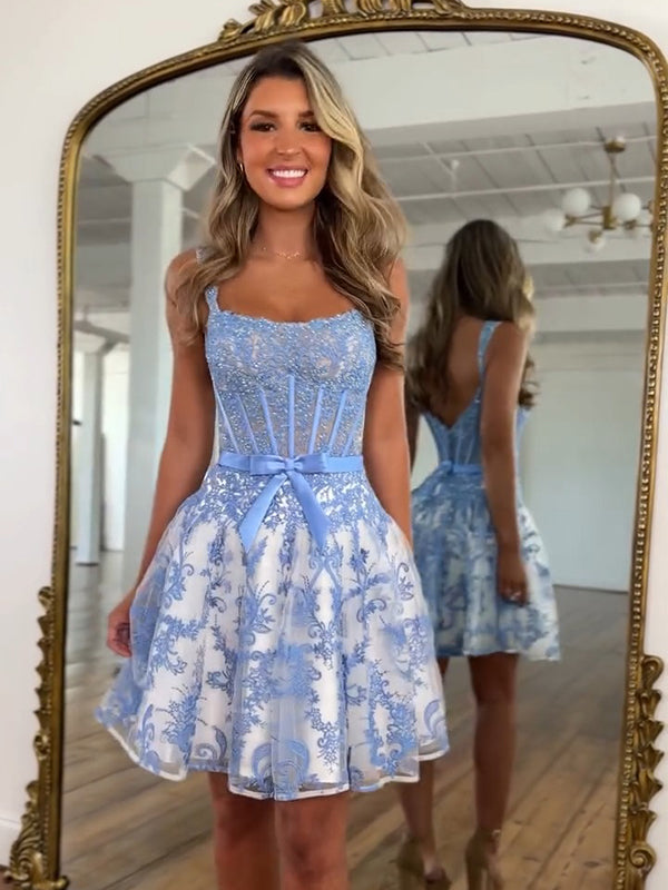 Robe de bal à corset imprimé floral bleu, coupe trapèze avec nœud