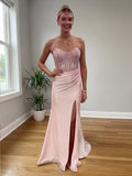 Robe de bal bustier rose blush avec corset et fente haute sur la cuisse