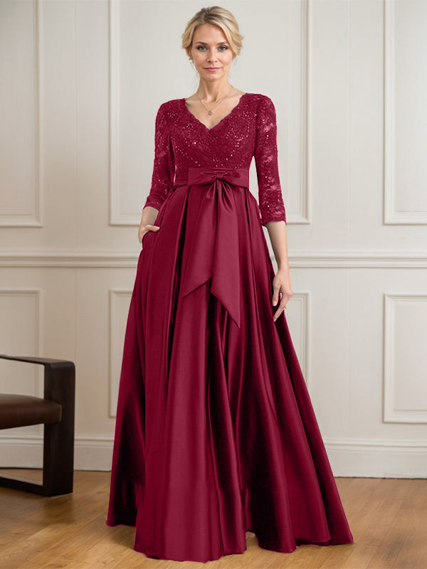 Robe mère de la mariée en satin et dentelle, coupe trapèze, col en V, longue avec nœud à sequins