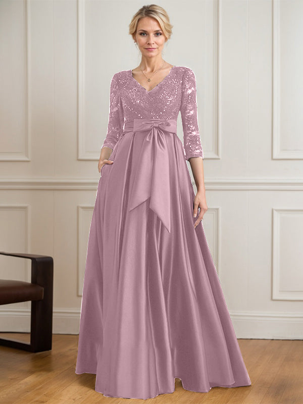 Robe mère de la mariée en satin et dentelle, coupe trapèze, col en V, longue avec nœud à sequins