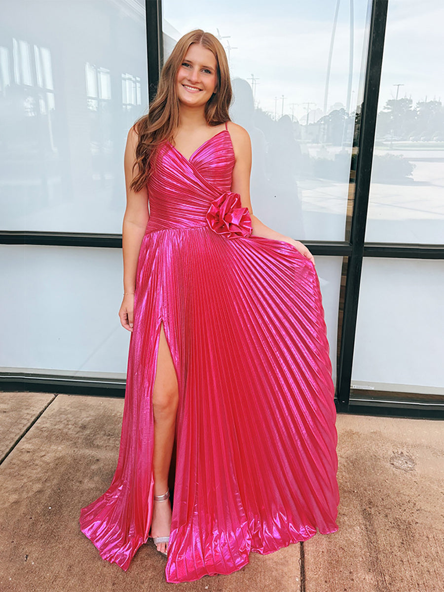 Robe de bal longue plissée métallisée fuchsia avec rosette