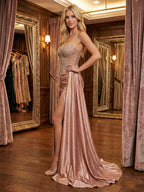 Abito da ballo glamour color rosa polvere con corsetto trasparente perline e spacco alto