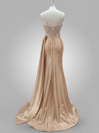 Abito da ballo glamour color rosa polvere con corsetto trasparente perline e spacco alto