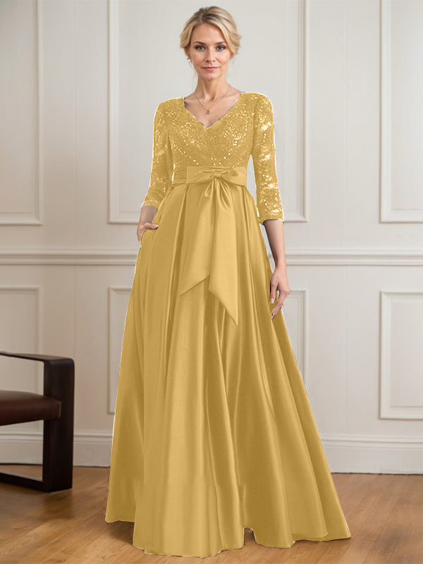 Robe mère de la mariée en satin et dentelle, coupe trapèze, col en V, longue avec nœud à sequins