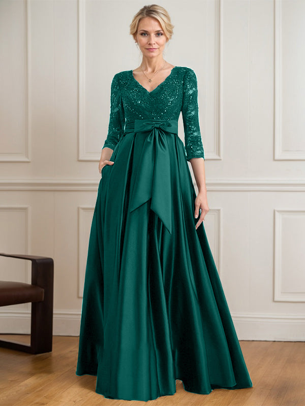 Robe mère de la mariée en satin et dentelle, coupe trapèze, col en V, longue avec nœud à sequins