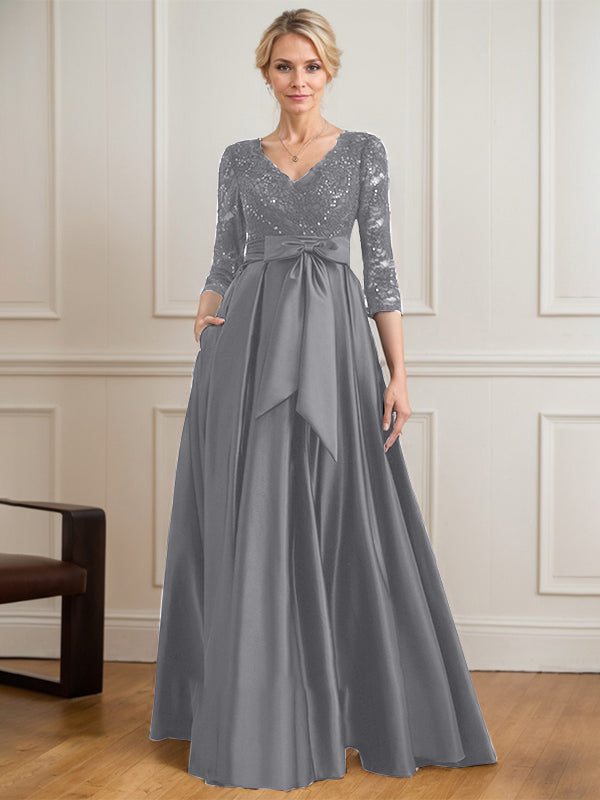 Robe mère de la mariée en satin et dentelle, coupe trapèze, col en V, longue avec nœud à sequins
