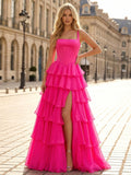 Vestido de baile com corpete, babados em camadas e fenda, na cor rosa choque