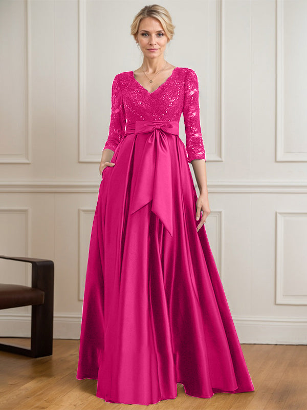 Robe mère de la mariée en satin et dentelle, coupe trapèze, col en V, longue avec nœud à sequins
