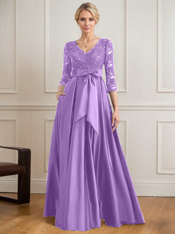 Robe mère de la mariée en satin et dentelle, coupe trapèze, col en V, longue avec nœud à sequins