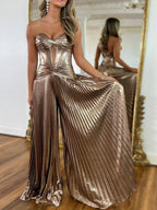 Abito lungo da ballo bronzo metallizzato plissettato senza spalline con corsetto e spacco