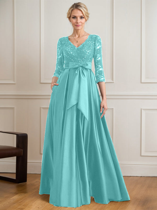 Robe mère de la mariée en satin et dentelle, coupe trapèze, col en V, longue avec nœud à sequins