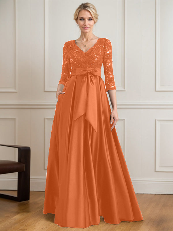 Robe mère de la mariée en satin et dentelle, coupe trapèze, col en V, longue avec nœud à sequins