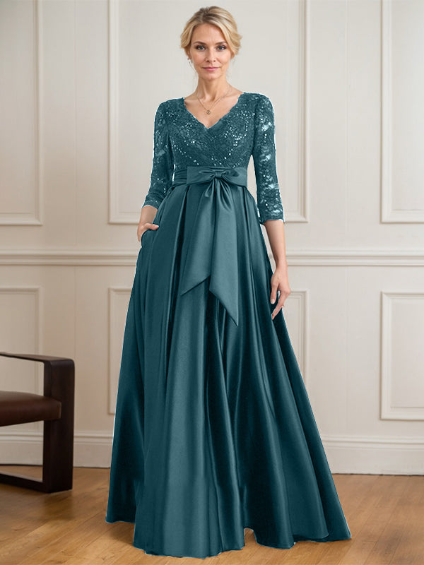 Robe mère de la mariée en satin et dentelle, coupe trapèze, col en V, longue avec nœud à sequins