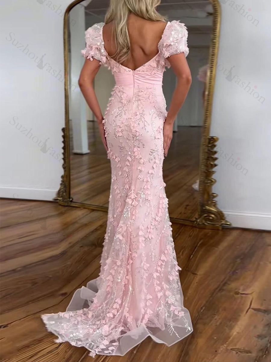 Vestido largo de fiesta sirena con lentejuelas rosas y detalle de lazo en forma de hoja
