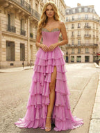 Robe de bal rose bustier à volants superposés avec ornements en cristal