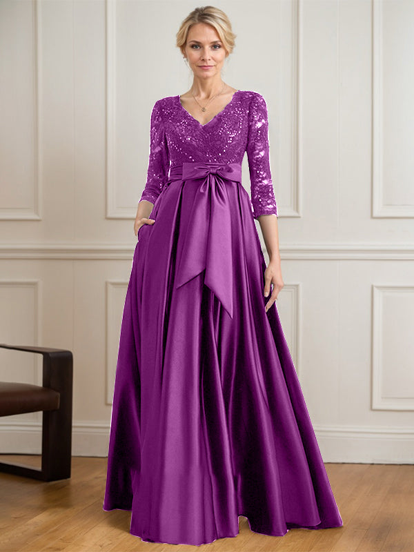 Robe mère de la mariée en satin et dentelle, coupe trapèze, col en V, longue avec nœud à sequins