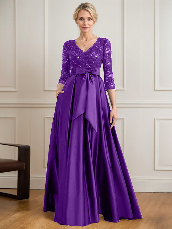 Robe mère de la mariée en satin et dentelle, coupe trapèze, col en V, longue avec nœud à sequins