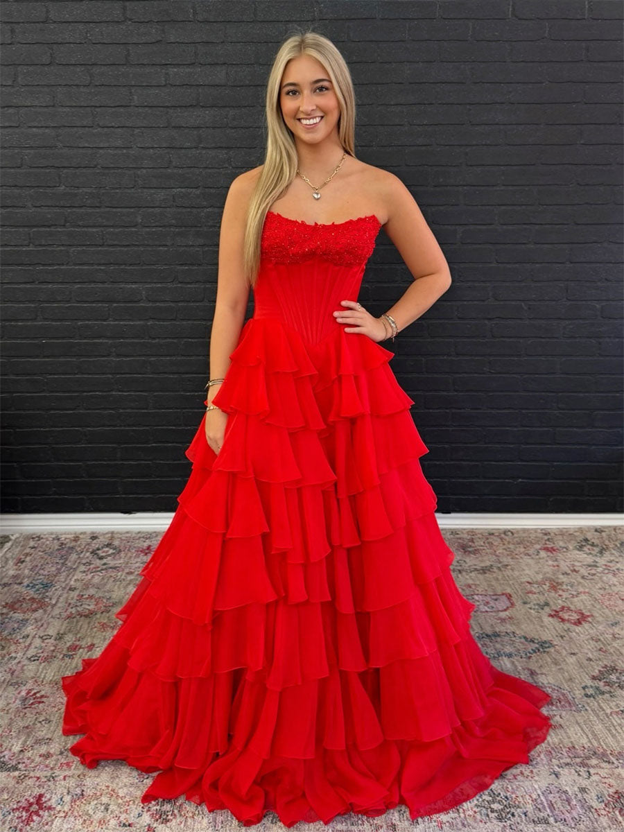 Robe de bal rouge longue ligne A sans bretelles avec volants en étages