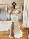 Off‑The‑Shoulder Draped Ruched Satin Sheath Bridal Gown With High Slit