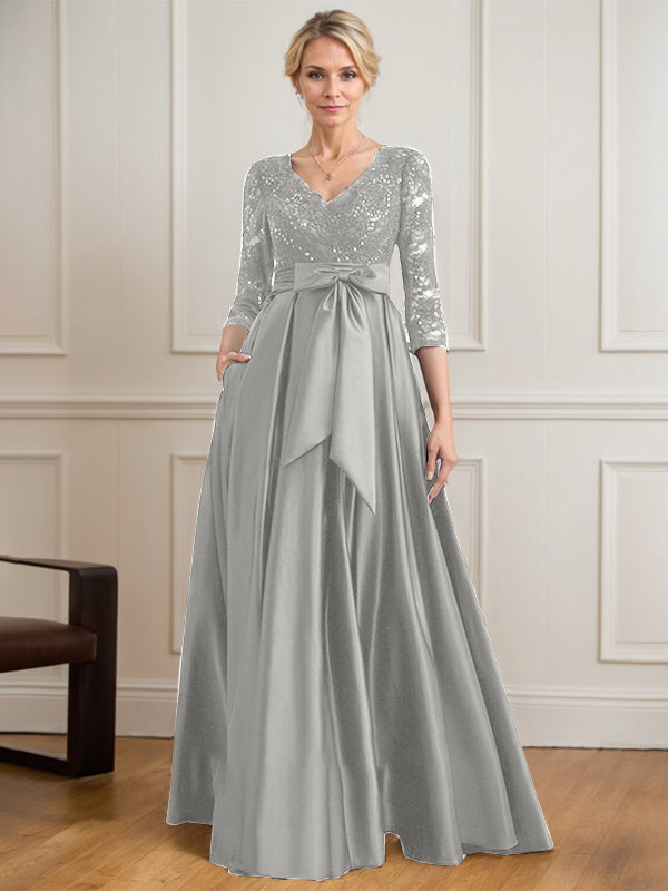 Robe mère de la mariée en satin et dentelle, coupe trapèze, col en V, longue avec nœud à sequins