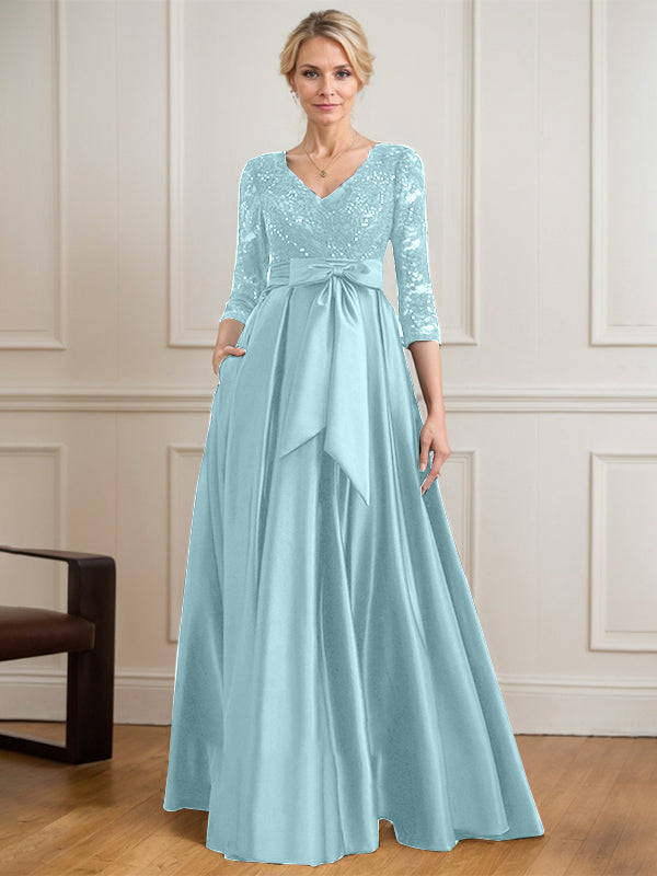 Robe mère de la mariée en satin et dentelle, coupe trapèze, col en V, longue avec nœud à sequins