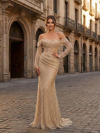 Robe de bal corset sirène dorée pailletée épaules dénudées perlée
