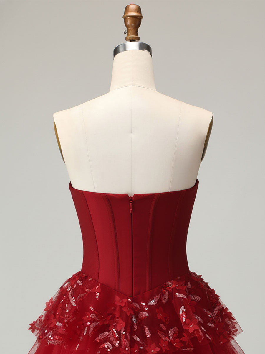 Robe de bal longue à volants avec corset et appliques florales 3D