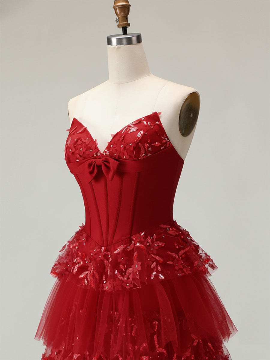 Robe de bal longue à volants avec corset et appliques florales 3D