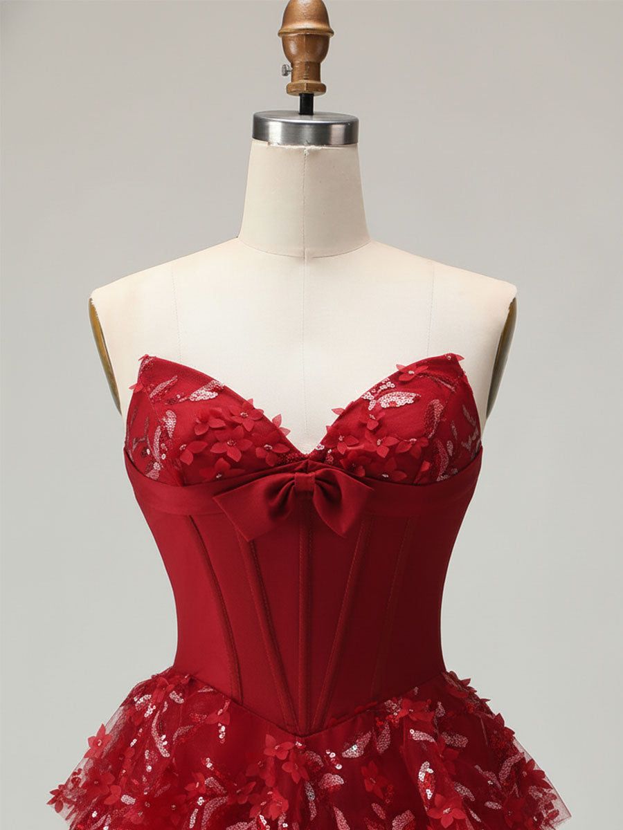 Robe de bal longue à volants avec corset et appliques florales 3D