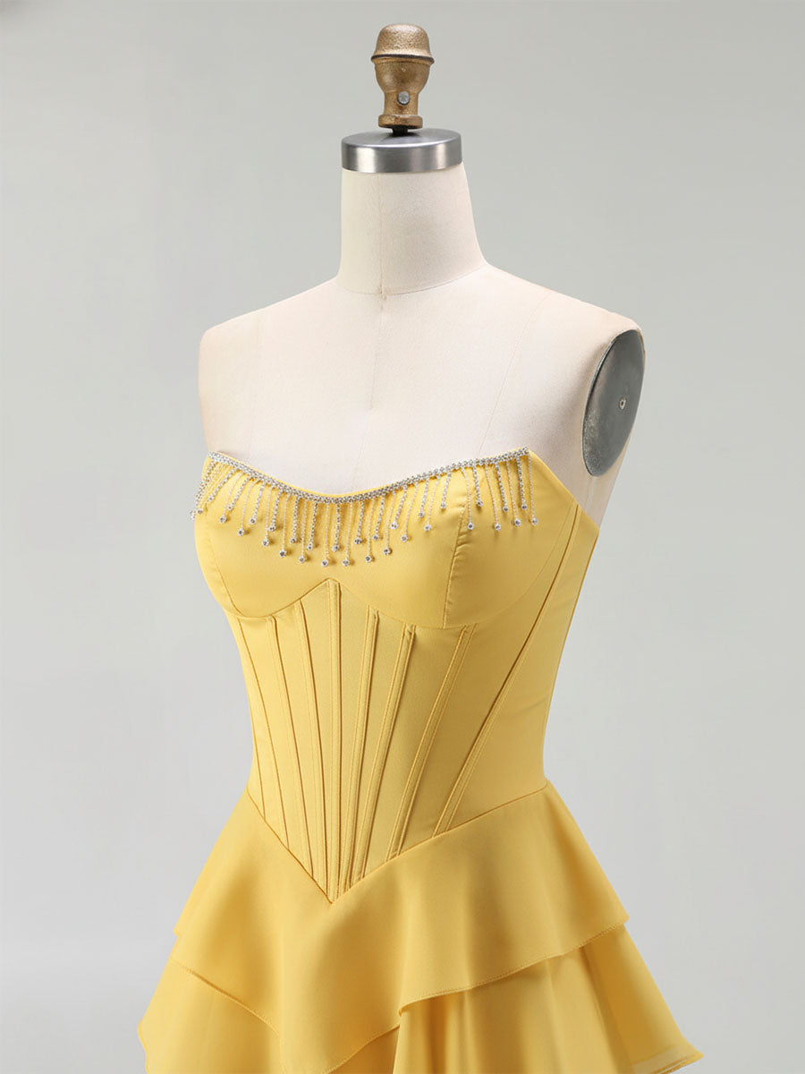 Robe de bal bustier à volants superposés avec franges perlées