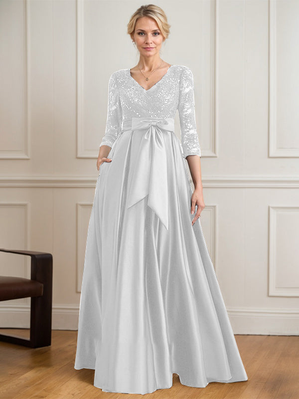 Robe mère de la mariée en satin et dentelle, coupe trapèze, col en V, longue avec nœud à sequins