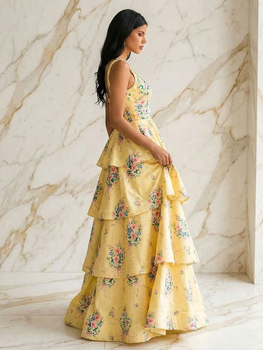 Vestido de fiesta en línea A con volantes y estampado floral amarillo con tirantes trenzados
