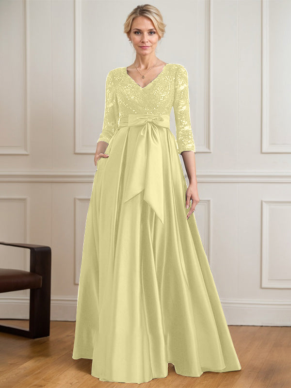 Robe mère de la mariée en satin et dentelle, coupe trapèze, col en V, longue avec nœud à sequins