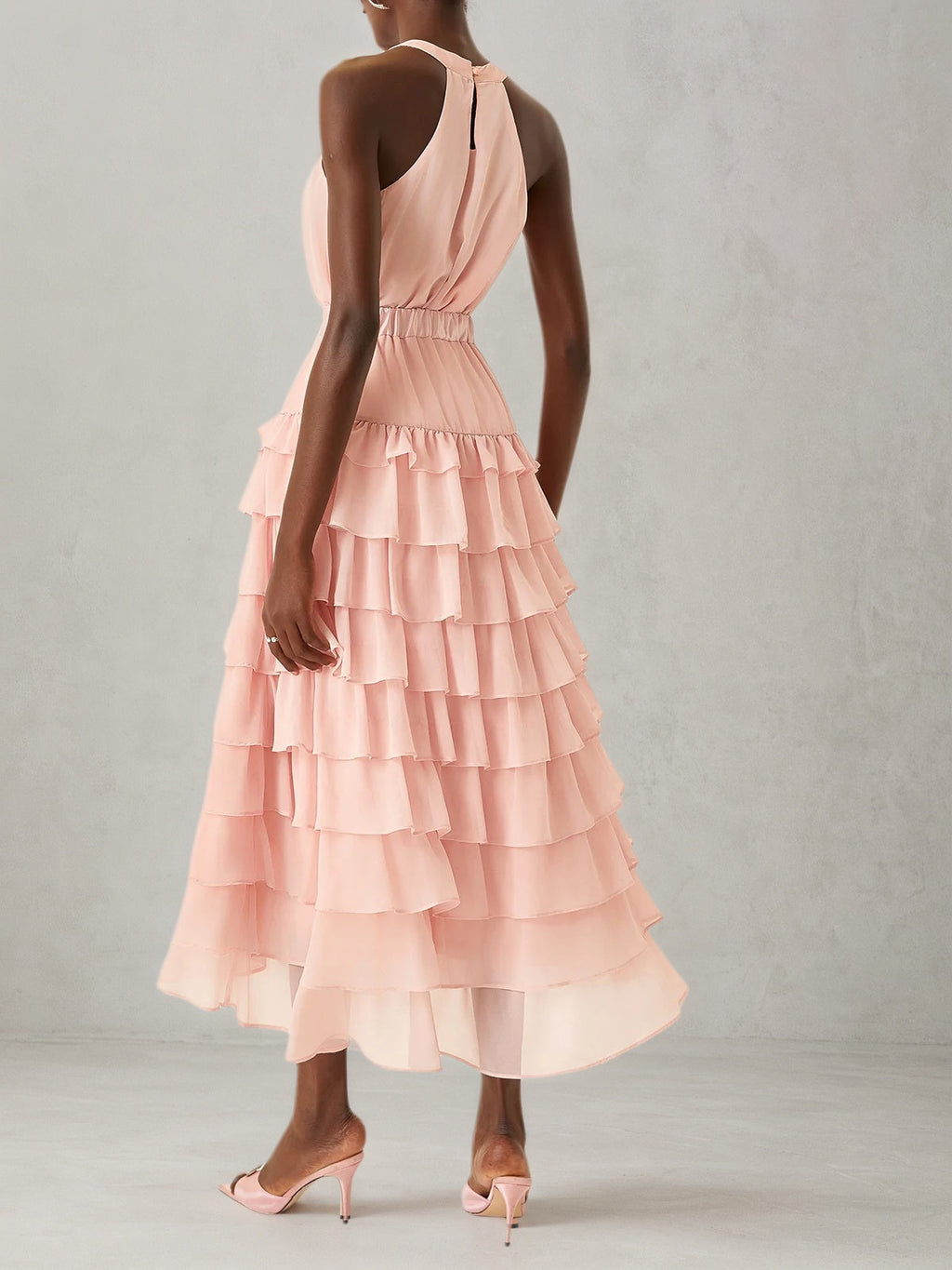 Rosa zweiteiliges Maxikleid aus gestuftem Chiffon mit Peplum, Neckholder und ärmellos in A-Linie