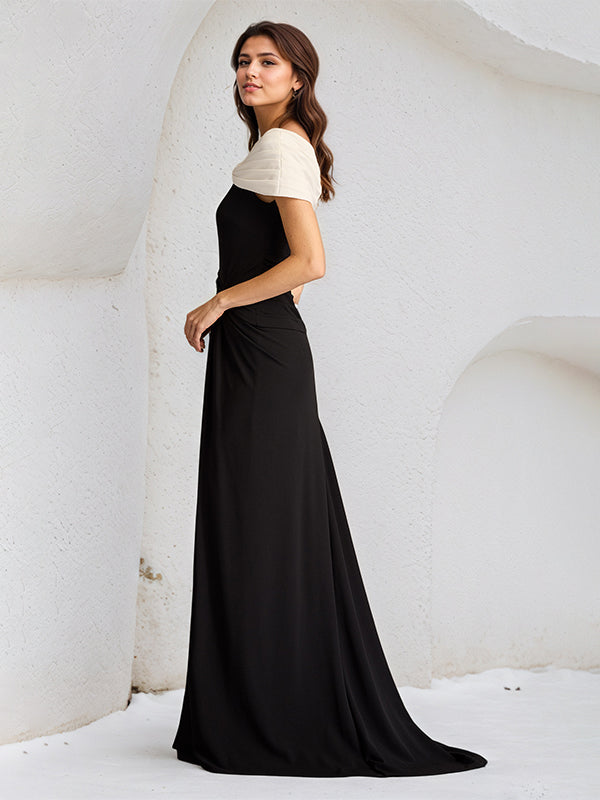 Vestido negro tipo columna de gasa sin mangas con escote asimétrico y abertura alta