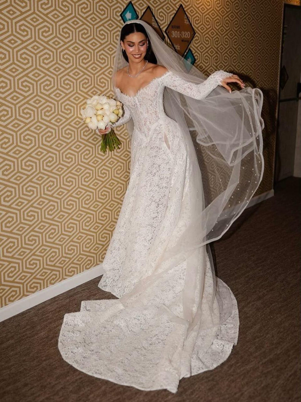 Elegant Off-the-Shoulder Long Sleeve Lace A-Line Wedding Dress