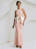 Abito da festa formale rosa in chiffon con taglio e schiena scoperta, lunghezza fino a terra, con fiocchi